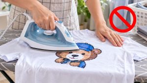 Mẹo giữ hình in trên áo không bị bong tróc: Không ủi trực tiếp lên hình in trên áo